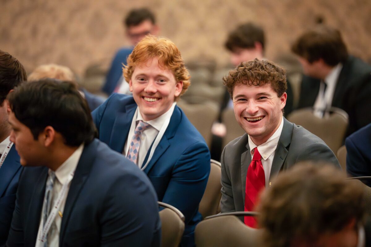 Two students at a PIKE U event